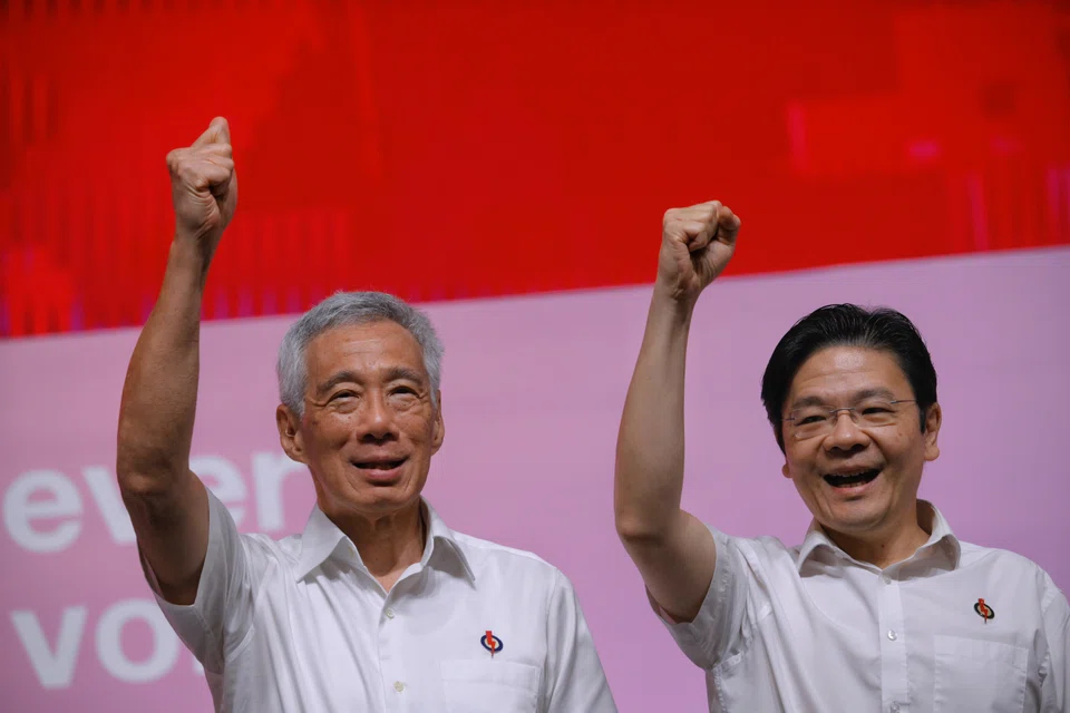 Prime Minister Lee Hsien Loong (left) and PAP Deputy Secretary General Lawrence Wong at the PAP Awards and Convention at Singapore Expo on November 5, 2023.