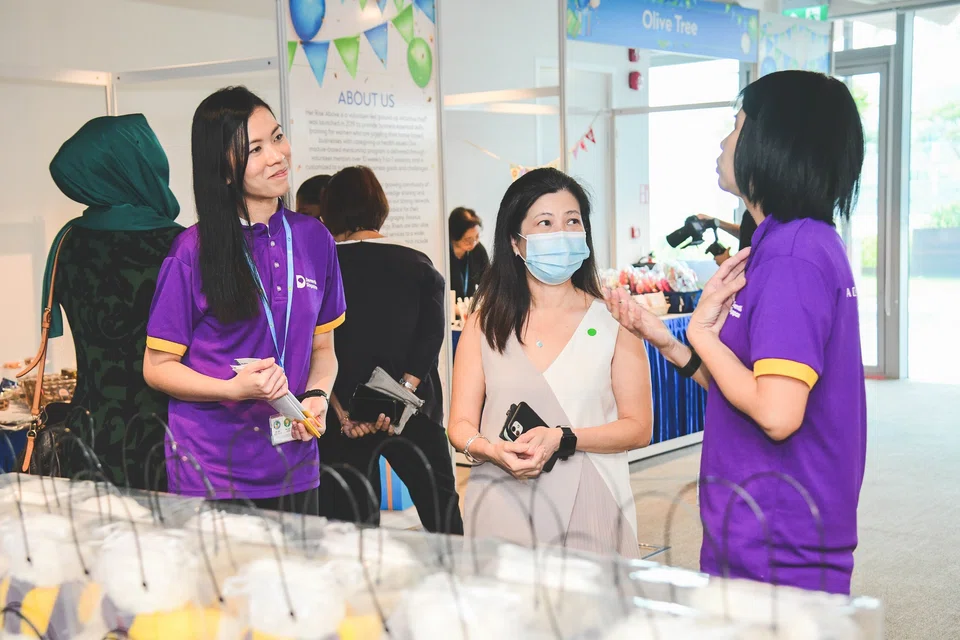 At Standard Chartered's Giving Marketplace on Nov 10, representatives from various organisations including Dementia Singapore shared with bank employees on ways to support their causes.