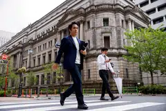 Under its massive stimulus programme, the Bank of Japan currently guides short-term interest rates at minus 0.1 per cent, caps the 10-year government bond yield around 0 per cent and continues to buy huge amounts of assets such as government bonds.