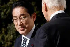 Japan's Prime Minister Fumio Kishida is greeted by US President Joe Biden as he arrives at the White House in Washington, US, Jan 13, 2023. 