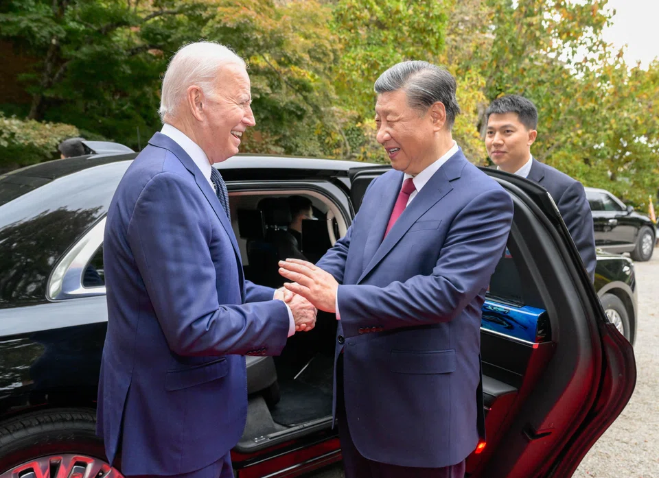 US President Joe Biden escorting Chinese President Xi Jinping to his car to bid farewell after their talks in the Filoli Estate in Woodside, south of San Francisco, California.