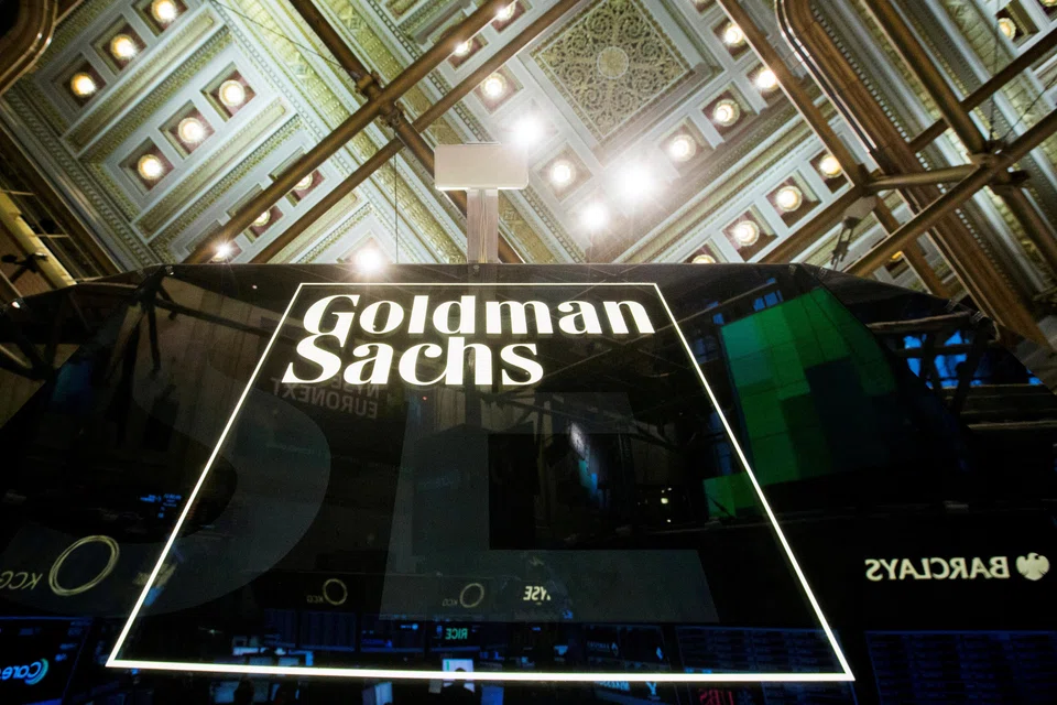 FILE PHOTO: A Goldman Sachs sign is seen above the floor of the New York Stock Exchange shortly after the opening bell in the Manhattan borough of New York, U.S. on January 24, 2014.    REUTERS/Lucas Jackson/File Photo                       GLOBAL BUSINESS WEEK AHEAD