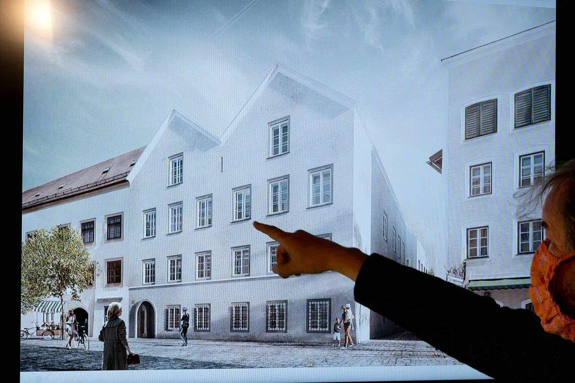 A screen showing the chosen plan for the architectural redesign of Adolf Hitler's birth house, during a press conference at the Austrian Interior ministry in Vienna in 2020. 