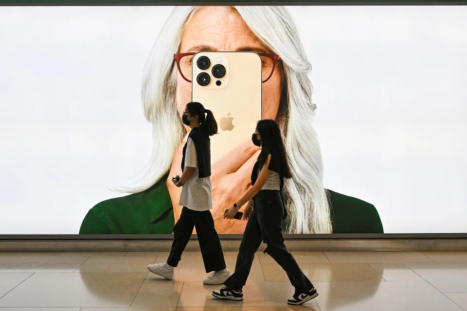 An Apple iPhone advertisement. A similar phone is said to have fallen out of Alaska Airlines Flight 1282 onto a Portland, Oregon roadside. It was found to be working, and became the subject of a TikTok video, which has since been verified by transport safety officials.   