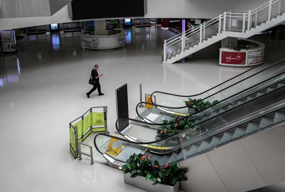 The atrium of the ferry terminal in Macau has been empty; there will be 10 trips every day once ferry services resume.