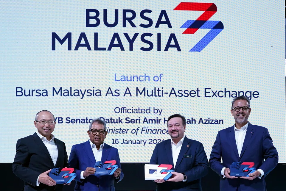 Bursa Malaysia launched a new gold investment product and several solutions for investors on Jan 16, 2024. From left: Bursa Malaysia chairman Abdul Wahid Omar, Securities Commission chairman Awang Adek Hussin, Second Finance Minister Amir Hamzah Azizan and Bursa Malaysia CEO Muhamad Umar Swift.