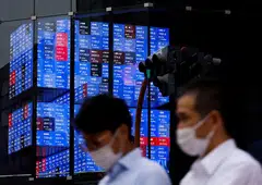 The benchmark Nikkei 225 index inched down 0.02 per cent, or 4.42 points, to end at 26,396.83. 