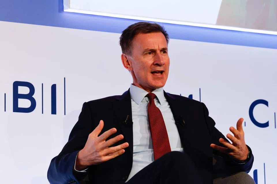 UK finance minister Jeremy Hunt is due to announce ways to boost business investment by £20 billion (S$33.5 billion) a year over the next decade, cut taxes and get more people into work, according to excerpts of his speech shared with media.