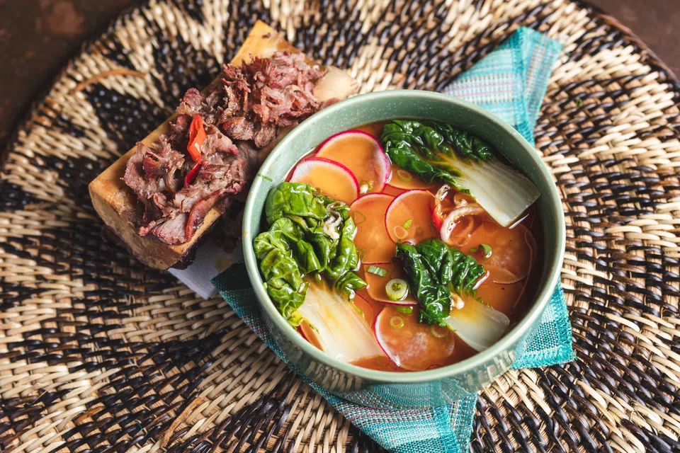 Roasted bone marrow and corn custard, inspired by Filipino Bulalo.