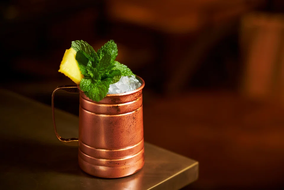 In a nod to Joseph Balestier's historical plantations, The Bar at 15 Stamford's signature cocktail Plantation 1840 features rum, pineapple juice, and sugarcane.