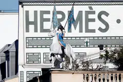 Hermes is defying a broader slump in the high-end goods market as its exposure to the ultra-rich shields it from the worst of the lull. 