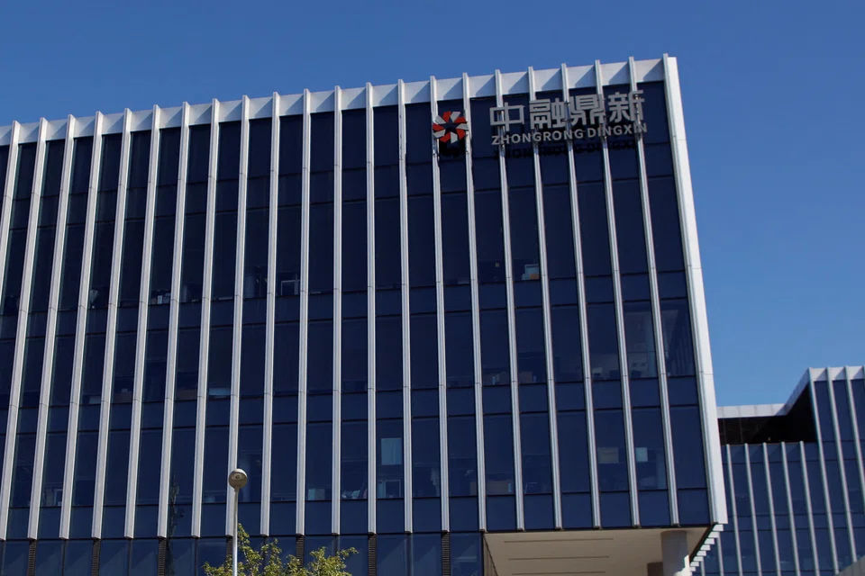 Signs of Zhongzhi’s problems emerge in July when Zhongrong International Trust, a leading trust company controlled by Zhongzhi, misses payments on dozens of investment products.