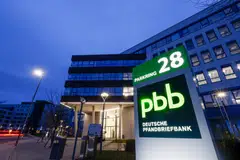 Pfandbriefbank, which has lent billions, including for offices in the US or Germany, rebuffed criticism on Friday that it was dragging its feet in facing up to the turn in the property market.