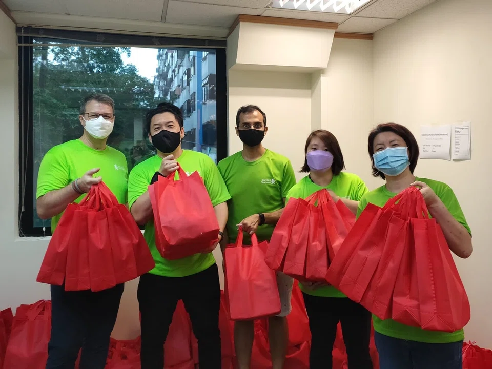 Over 360 volunteers gathered to pack and distribute the National Day care pack from early July to August.