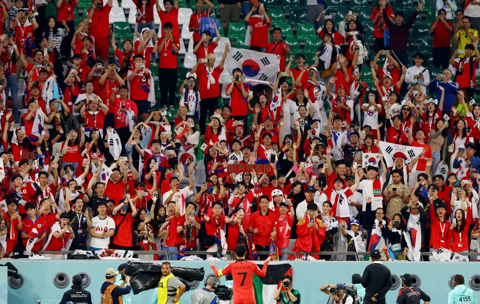 Son celebrating with his fans in Qatar on Dec 2 after his country's World Cup victory over Portugal that sealed a place in the Round of 16.