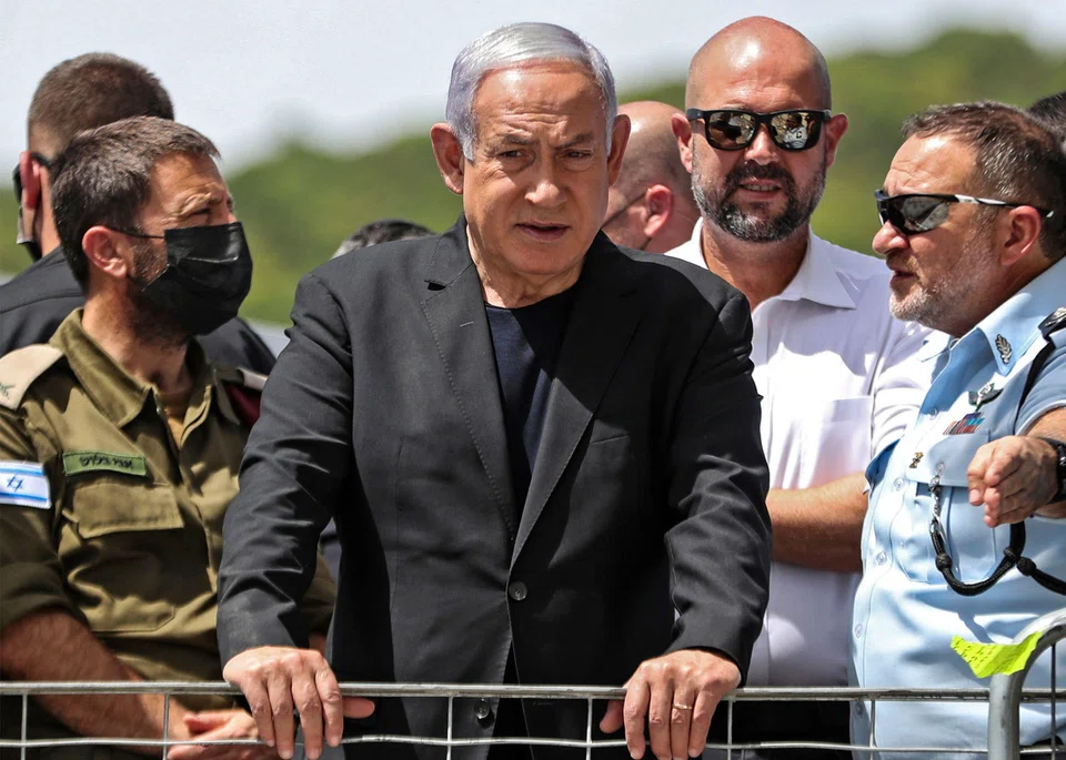(Centre) Israeli Prime Minister Benjamin Netanyahu's comments came one day after US President Joe Biden said Netanyahu “must pay more attention to the innocent lives being lost as a consequence of the actions taken” in Gaza.