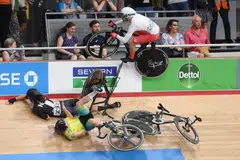 Jackson (left) and Duffy (centre) slid up the banking, forcing Walls (right) up on to the barrier and then over it.