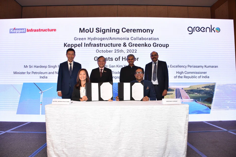MOU signing ceremony between Keppel Infrastructure and Greenko. Standing: Keppel's chief executive officer Loh Chin Hua (first from left), Trade and Industry Minister Gan Kim Yong (second from left), High Commissioner of India to Singapore, Periasamy Kumaran, (third from left), Greenko's joint managing director and founder Mahesh Kolli (fourth from left). Seated: Keppel Infrastructure's CEO Cindy Lim (left) and Greenko's chief executive and founder Anil Kumar Chalamalasetty (right). 