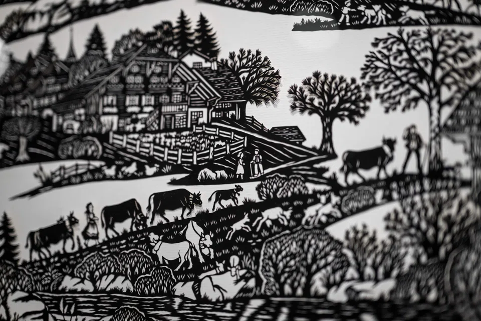 Marianne Dubuis is reinventing the Swiss traditional art of paper cutting, which typically shows Alpine landscapes and cows heading to mountain pastures, by infusing a large dose of poetry and modernity.