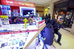 Special force police officers take part in a simulation exercise in Bangkok ahead of the Apec Summit in November. 