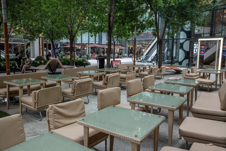 An empty outdoor area of a restaurant in Beijing on Sunday, (Jun 19).  China’s biggest cities are doubling down on Covid-19 testing in a bid to stamp out persistent infections, as the US ambassador to the country warns the zero-tolerance approach is likely to last beyond this year and actively chill foreign investment.  