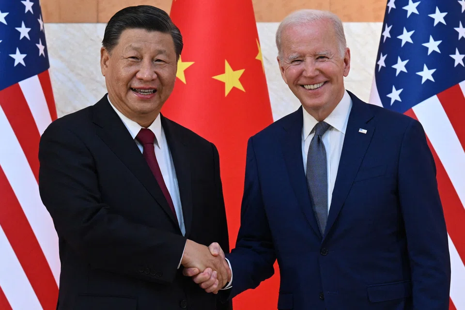US President Joe Biden with China's President Xi Jinping in their meeting on the sidelines of the G20 Summit in Bali on Monday (Nov 14). 