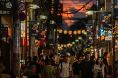 Japan’s economy grew at its fastest in more than two years in the April-June period as brisk auto exports and tourist arrivals helped offset the drag from a slowing post-Covid consumer recovery.