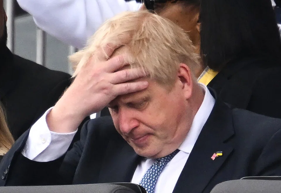 FILE PHOTO: Britain's Prime Minister Boris Johnson's premiership is in danger, though there is no certainty that he will be ousted. The vote takes place in London at 2 am Singapore time on Tuesday.