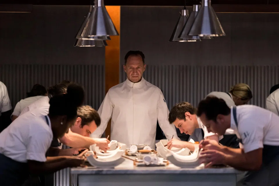 The Menu, which debuted in theatres last week, stars Ralph Fiennes as chef Julian Slowik.
