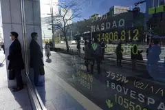 Tokyo stocks opened sharply lower on Friday after a rout on Wall Street as more central banks hiked interest rates in efforts to tame runaway inflation, fuelling recession fears. 