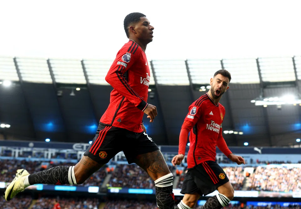 Manchester United's Marcus Rashford (left) and Bruno Fernandes, seen in action in a recent league game, both scored in their team's 3-2 win over Liverpool in the FA Cup fourth round in January 2021. 
