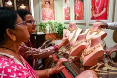 Women shopping for gold jewellery in Hyderabad. Unsecured retail loans such as credit cards and personal loans are reported to have grown at an annual rate of 23 per cent over the past five years in India.