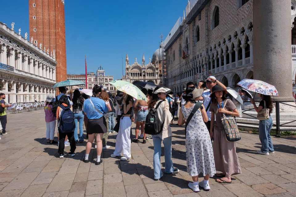 Venice has been preparing to introduce a fee for day-trippers to control visitor numbers, but has been delayed by objections.