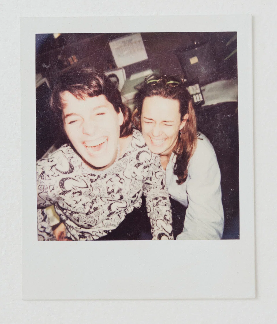 A polaroid of Lisa Degliantoni, left, and Ginny Cahill at Sussex Publishers in New York in 1998. Degliantoni, now 50, feels that she owes parts of her career, her family and her very sense of self in the workplace to those two first work friends. 