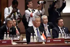 PM Lee notes that more private funds are needed to combat the “existential” threat of climate change. 