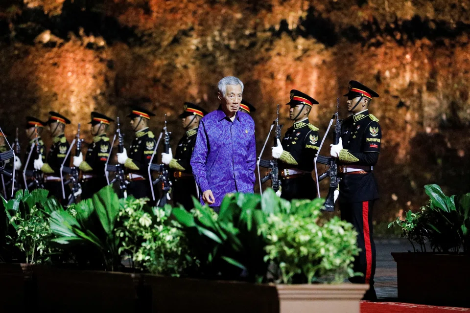 Prime Minister Lee Hsien Loong arriving at a dinner for the G20 leaders in Bali on Tuesday. He says it would have been a weakening of the G20's moral case if the group failed to issue a strong statement on Russia's actions in Ukraine.