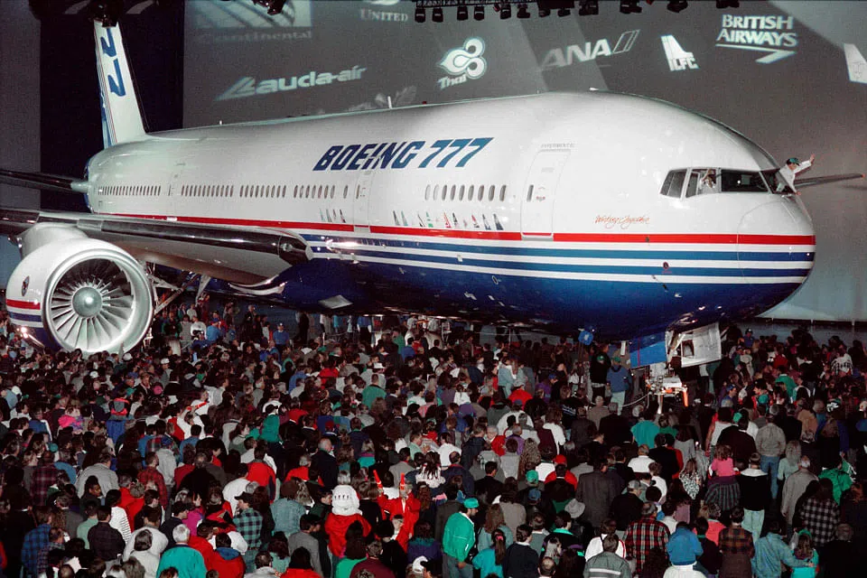 Boeing slows 777 wide-body output, boosts dividend by 30%