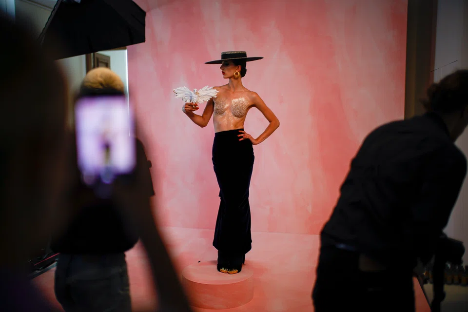 Models presenting looks at Schiaparelli couture for the Fall 2022 fashion show in Paris this week. The show issued the reminder that clothing still has the ability to confound, to challenge convention, and to show off astounding construction - a wake-up call in a time of global crises, when fashion viewers are mired in torpor and cynicism. 
