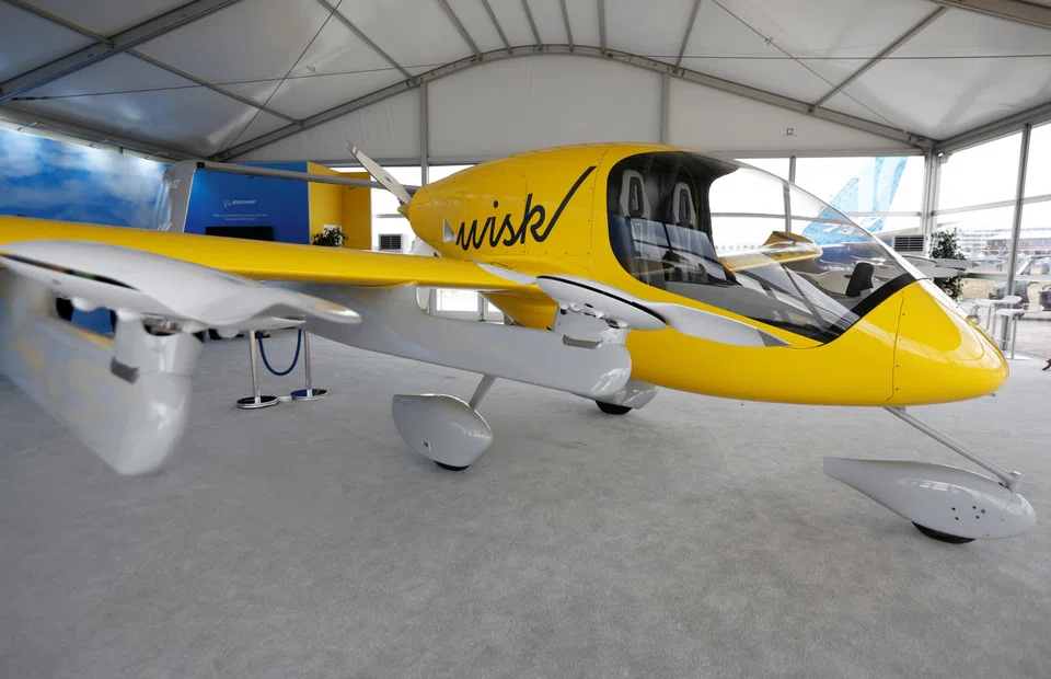 A Wisk autonomous air taxi on show at the Farnborough International Airshow, in Farnborough, Britain, in July. A number of companies are in the race to come up with the first commercially viable, green method of transport that also meets safety requirements. 