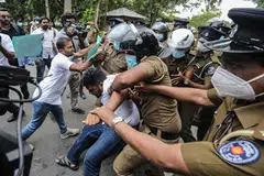 On Friday police fired tear gas at dozens of demonstrators outside parliament, in the latest in more than a month of sporadically violent anti-government protests amid shortages of imported food, fuel and medicines..