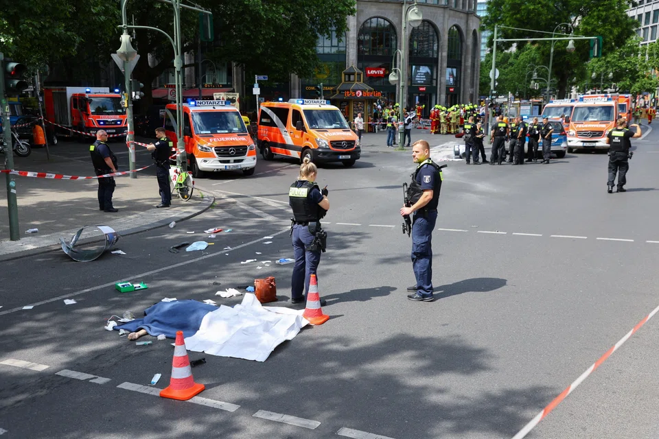 General view with one dead on the street after a car crashed into a group of people, injuring dozens of others, at Tauentzienstrasse near Kaiser Wilhelm Memorial Church in Berlin, Germany June 8, 2022. 