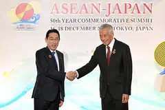 Japan's Prime Minister Fumio Kishida (left) with   PM Lee at the  the opening session of the Asean-Japan Commemorative Summit Meeting at the  Okura Tokyo hotel on Dec 17.