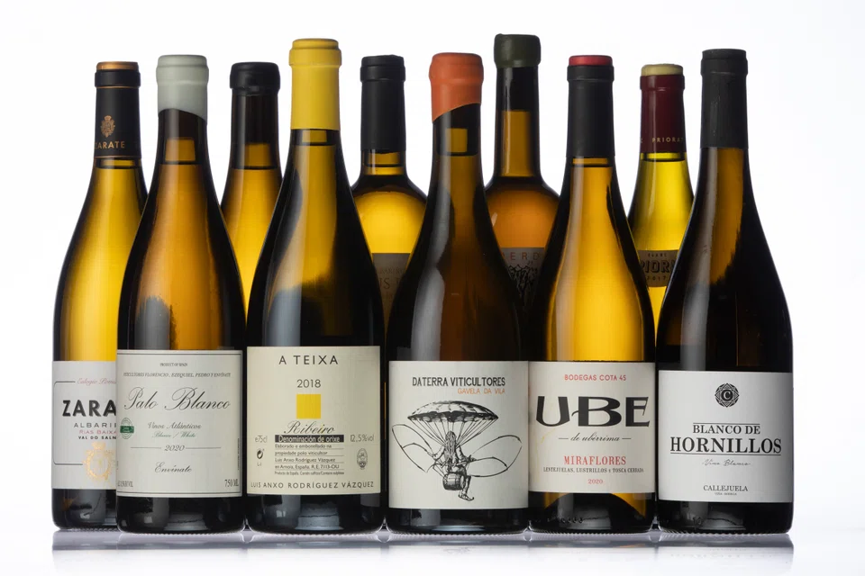 Eric Asimov writes that although Spain is overwhelmingly associated with red wines, he's been intrigued over the last few years to taste unusual and captivating white wines coming from every corner of Spain.