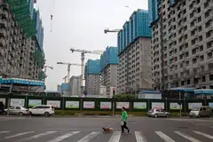 Beijing cuts the down-payment ratio for second homes to 40 per cent or 50 per cent, depending on the locations of the properties, according to city's housing authorities. 