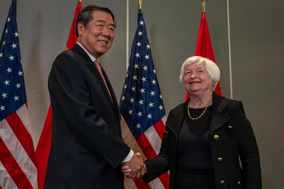 US Treasury Secretary Janet Yellen and China's vice premier He Lifeng shake hands during a meeting in San Francisco, California, US, on Nov 9, 2023. 