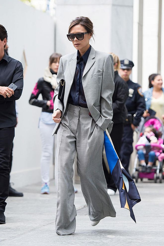 Yet another iconic fashion star proving that blazer and loose trousers are the best thing to wear ever. Victoria Beckham rocked the grey ensemble with her hair pulled back, looking stylish as always. Photo: Getty