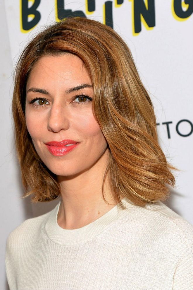 Sofia Coppola keeps her hair out of her face with a round brush blowdry. 