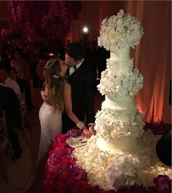 If you fell in love with Vergara's custom Zuhair Murad couture gown, wait until you see her cake. Designed by Sylvia Weinstock, the five-tiered cake featured a quilted design, flowers over each tier, and was topped with a giant floral arrangement. Photo: Instagram