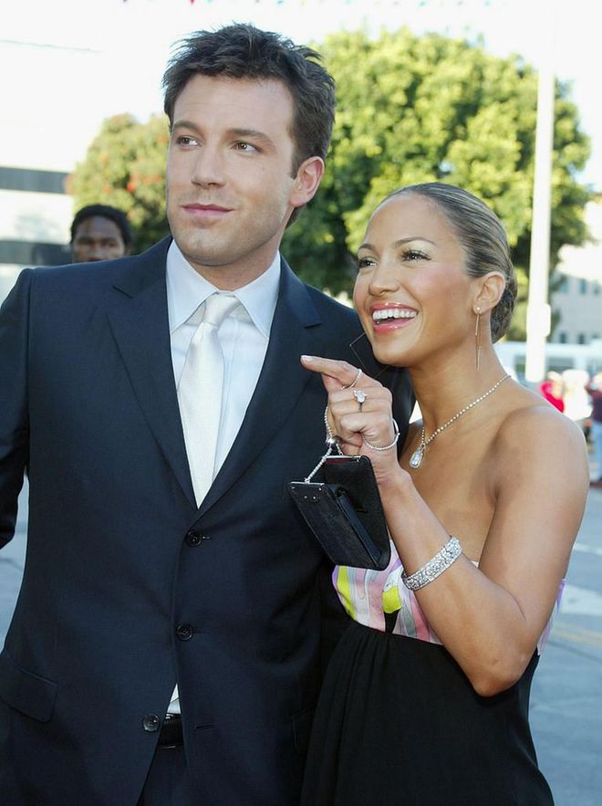 J. Lo, wearing her 6.1-carat pink diamond ring, and Ben Affleck in 2003. (Photo: Kevin Winter/Getty Images)