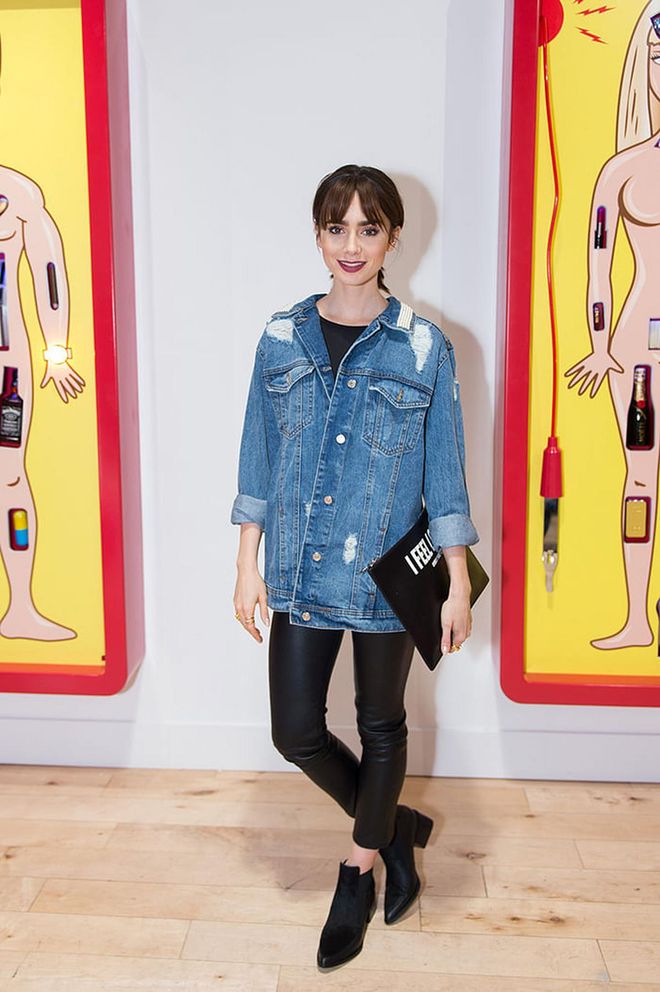 Actress Lily Collins injected subtle hints of masculinity in her outfit with leather leggings and a stand-out denim jacket. Photo: Getty
